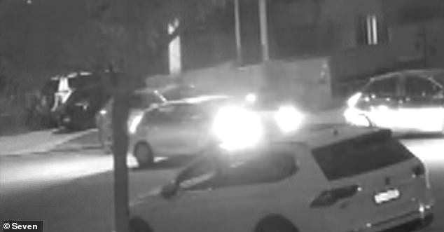 Chilling CCTV footage captured the moment the white Hyundai hatchback (pictured centre) arrived at the property before multiple shots were fired.