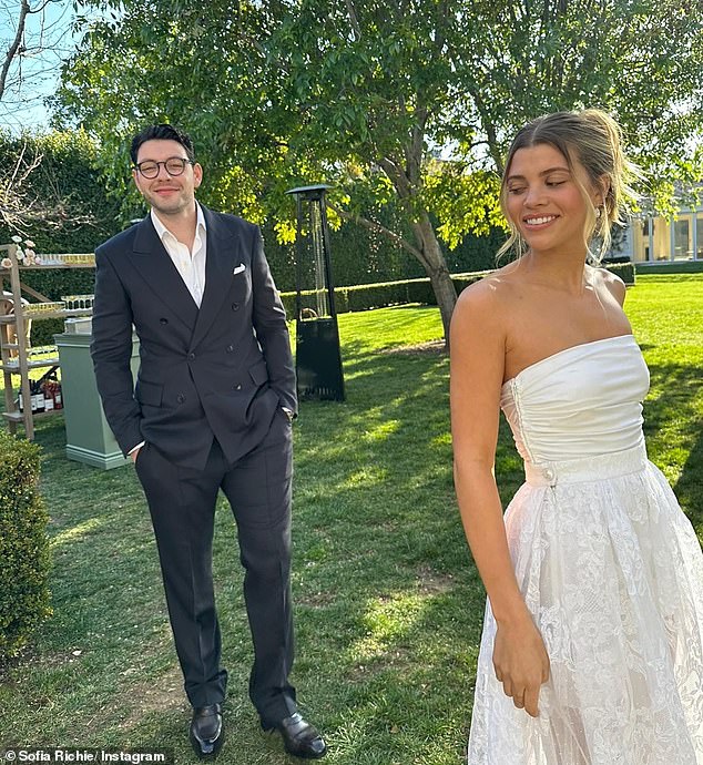 Lionel Richie's daughter also wrote a sweet caption for her other half, writing: '1 year ago today!  I want to marry you a million times again @elliotgrainge
