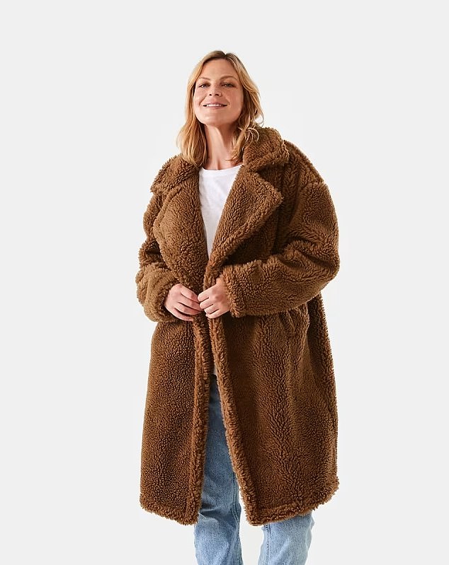 Last month, Kmart Australia quietly launched a stylish yet cozy teddy coat.  The $49 Teddy Longline Jacket was previously on shelves in 2021 in different colors and has returned in the 'biscuit' hue.
