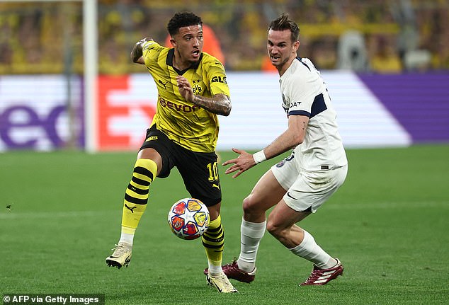 Jadon Sancho (left) returned to his best level and was a nuisance for PSG all night on the wing