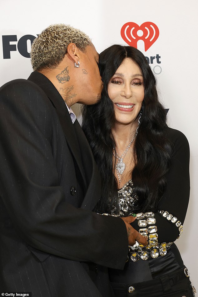 Alexander kissed her on the cheek as they walked the red carpet at the Dolby Theatre.  Cher was honored at the 2024 iHeartRadio Music Awards last month.