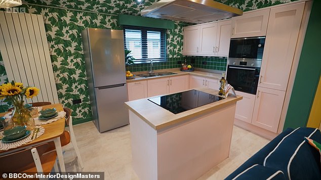 In Pink: Rosin paired a pale pink kitchen with her bold nature-inspired wallpaper in the kitchen.