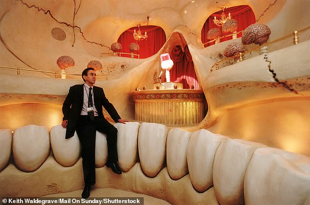 Pictured: John Hackney, Creative Director of The Body Zone at The Millennium Dome, inside The Body Zones Cranium