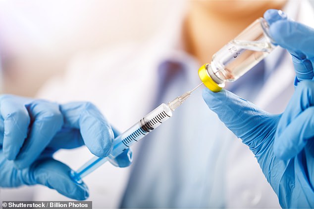 The NHS expects cancer vaccines to be available to thousands of patients in the next five years.  Pictured: A file image of a needle drawing liquid from a vial.