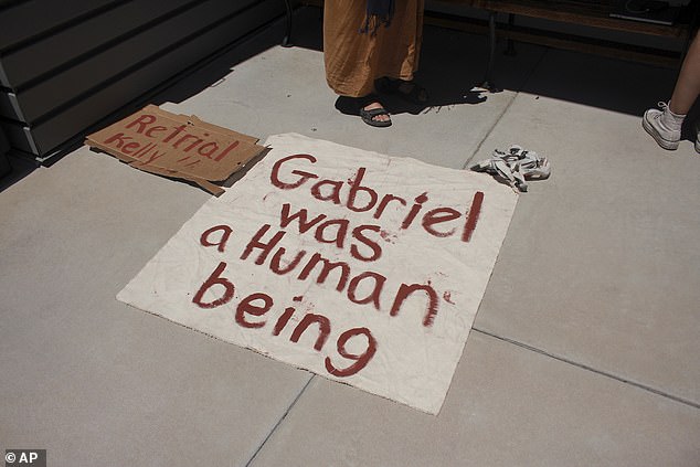 A poster that refers to Gabriel Cuen-Buitimea, a Mexican found dead on George Alan Kelly's ranch.