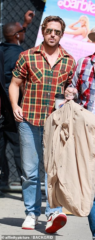 Ryan arrived looking casual in a red, green and yellow plaid button-down shirt with rolled-up sleeves.