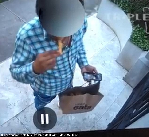 Security footage obtained by Triple M shows the driver devouring the chip while waiting for her to arrive at the door.