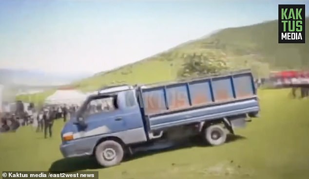 The truck is seen rolling down the hill in a second clip of the incident.