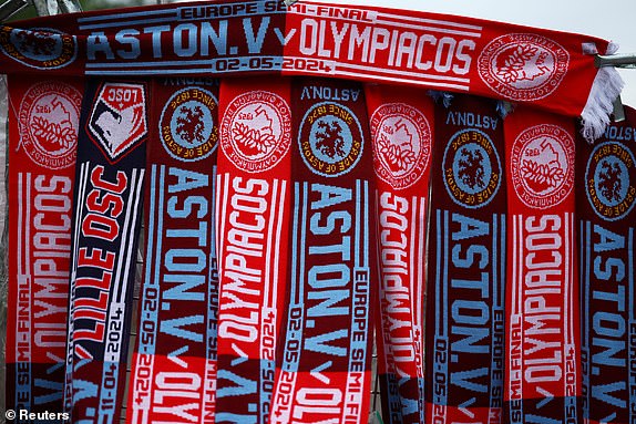 Soccer Football - Europa Conference League - Semi Final - First Leg - Aston Villa v Olympiacos - Villa Park, Birmingham, Britain - May 2, 2024 General view of match day scarves on sale outside the stadium before the match REUTERS/ Molly Darlington