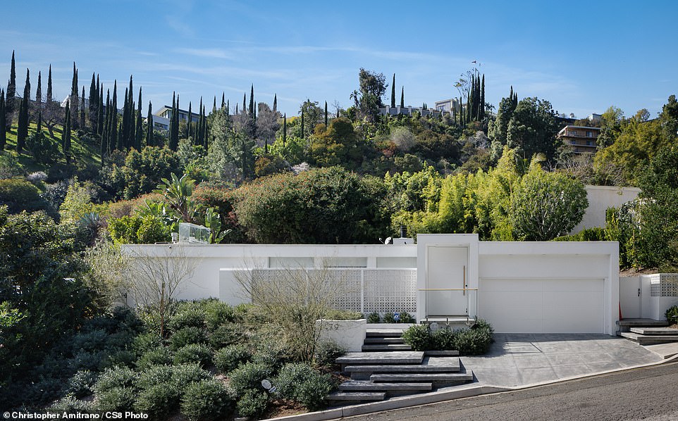 The Hollywood Hills property, located at 1479 Rising Glen Road, was a three-bedroom, four-bathroom home spanning 2,566 square feet on a 9,622-square-foot lot.