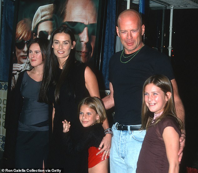 The Willis family has remained very close despite Demi and Bruce's divorce in 2000 after 13 years of marriage;  seen in 2001