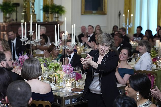 Randi Weingarten, president of the American Federation of Teachers, stands after being recognized by first lady Jill Biden at Thursday night's state Teachers of the Year dinner.