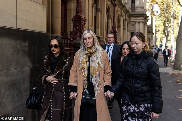 Family and friends of Monique Lezsak leave the Supreme Court of Victoria