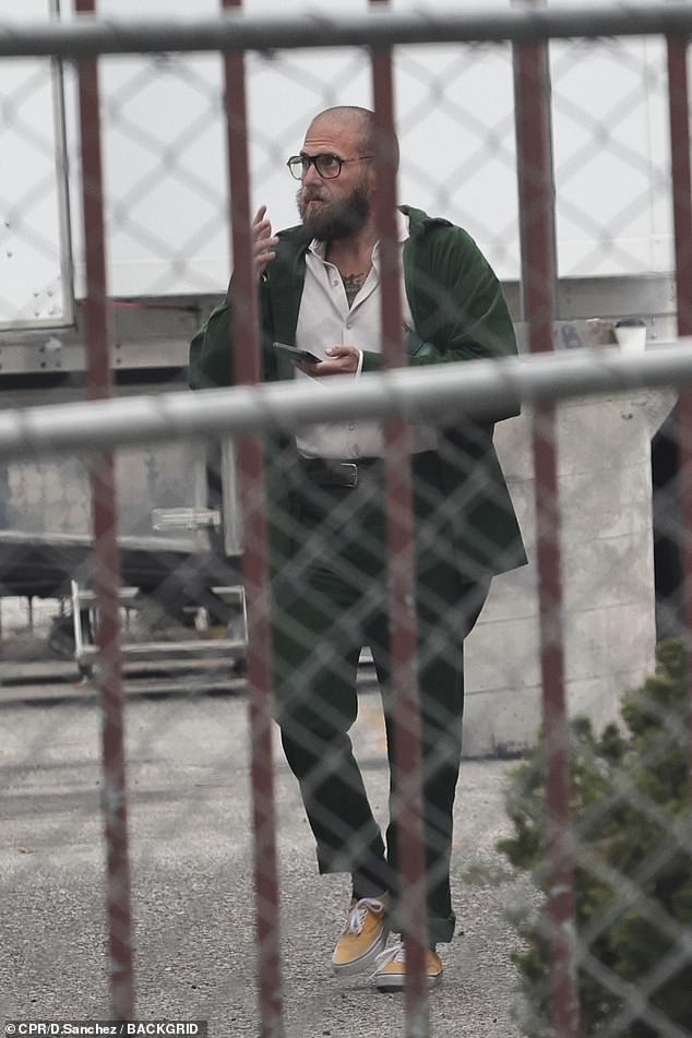 The Gretchen singer recently landed a mysterious role in Apple Studios' Outcome, which is Jonah Hill's (pictured April 4 on the Los Angeles set) revenge comedy about a damaged Hollywood star who confronts to her demons after being blackmailed.