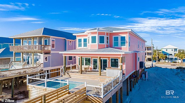 A $4.6 million home sits by the water in Gulf Shores, Alabama.  Experts say sea level rise is irreversible