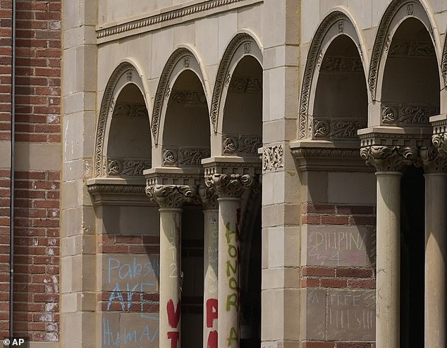 The front of Royce Hall and Powell Library was covered in graffiti and trash.