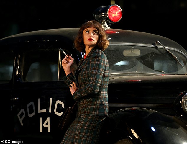 Elsewhere on the set, Penelope Cruz, wearing a stylish green plaid suit, was seen leaning on a police car while smoking a cigarette.