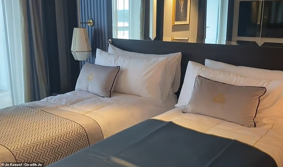 Jo's room is a Queens Grill Suite (above), one of the most prestigious and sought-after cabins on the ship.