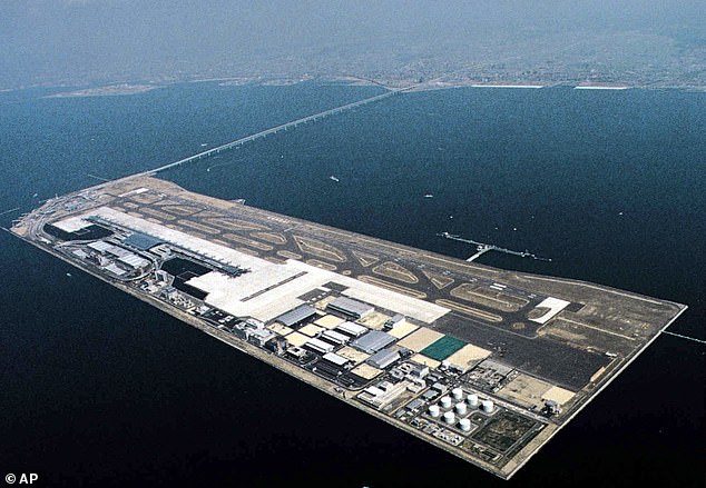 Kansai International Airport will celebrate its 30th anniversary in September and will mark three decades without losing a single piece of luggage (pictured in 1994 when it opened for operations)