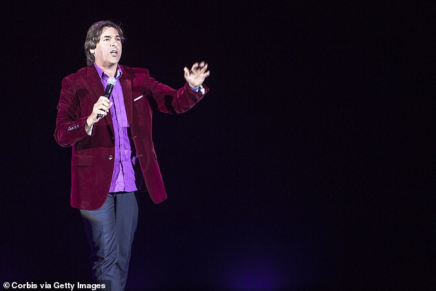 The comedian, 63, revealed he had been diagnosed with the disease in October after discovering a lump on his neck while shaving, but said it was a cancer 'that you can get rid of' (pictured at the Hammersmith Apollo in 2014).