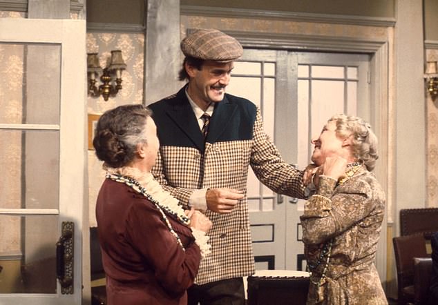 Basil Fawlty with Miss Gatsby and Miss Tibbs, portrayed by Renee Roberts and Gilly Flower