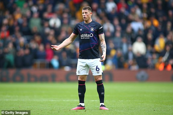 WOLVERHAMPTON, ENGLAND - APRIL 27: Ross Barkley of Luton Town reacts during the Premier League match between Wolverhampton Wanderers and Luton Town at Molineux on April 27, 2024 in Wolverhampton, England.  (Photo by Copa/Getty Images)