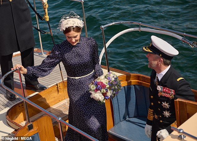 The Queen was presented with a bouquet of flowers as she departed for the waters as the couple embark on their summer tour.