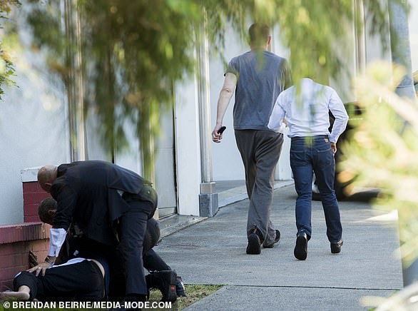 He eventually walked away while his bodyguards comforted Mr Gyngell as he lay on the ground.