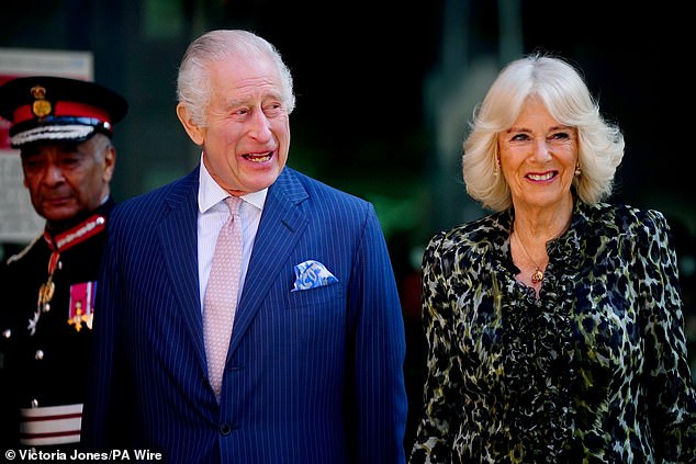 King Charles and Queen Camilla arrive for a visit to the Macmillan Cancer Center at University College Hospital, London, on April 30.