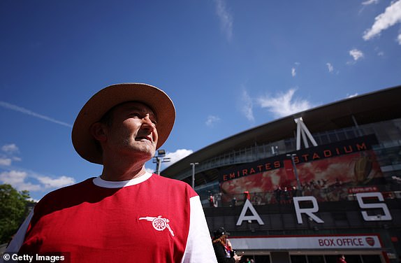 LONDON, ENGLAND - MAY 4: An Arsenal fan looks outside the stadium before the Premier League match between Arsenal FC and AFC Bournemouth at Emirates Stadium on May 4, 2024 in London, England.  (Photo by Ryan Pierse/Getty Images)