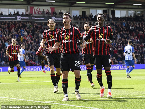 BOURNEMOUTH, ENGLAND - APRIL 28: Marcos Senesi (centre) of Bournemouth celebrates scoring the opening goal during the Premier League match between AFC Bournemouth and Brighton & Hove Albion at the Vitality Stadium on April 28, 2024 in Bournemouth, England .(Photo by David Horton - CameraSport via Getty Images)