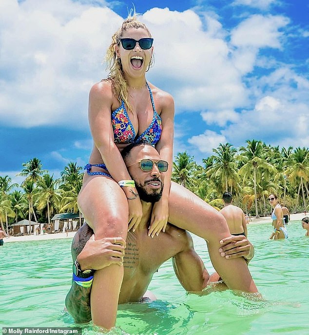 The duo also shared a photo of Molly and Tyler playing in the sea while Molly could be seen riding on her boyfriend's shoulders.