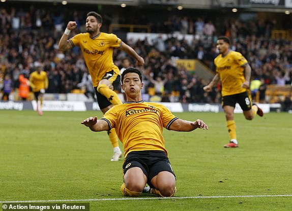 Soccer Football - Premier League - Wolverhampton Wanderers v Manchester City - Molineux Stadium, Wolverhampton, Britain - September 30, 2023 Wolverhampton Wanderers' Hwang Hee-chan celebrates scoring their second goal Action Images via Reuters/Ed Sykes NO AUDIO, VIDEO USED UNAUTHORIZED, DATA, LISTS, CLUB/LEAGUE LOGOS OR 'LIVE' SERVICES.  ONLINE IN-GAME USE LIMITED TO 45 IMAGES, NO VIDEO EMULATION.  NOT USED IN BETTING, GAMES OR SINGLE CLUB/LEAGUE/PLAYER PUBLICATIONS.