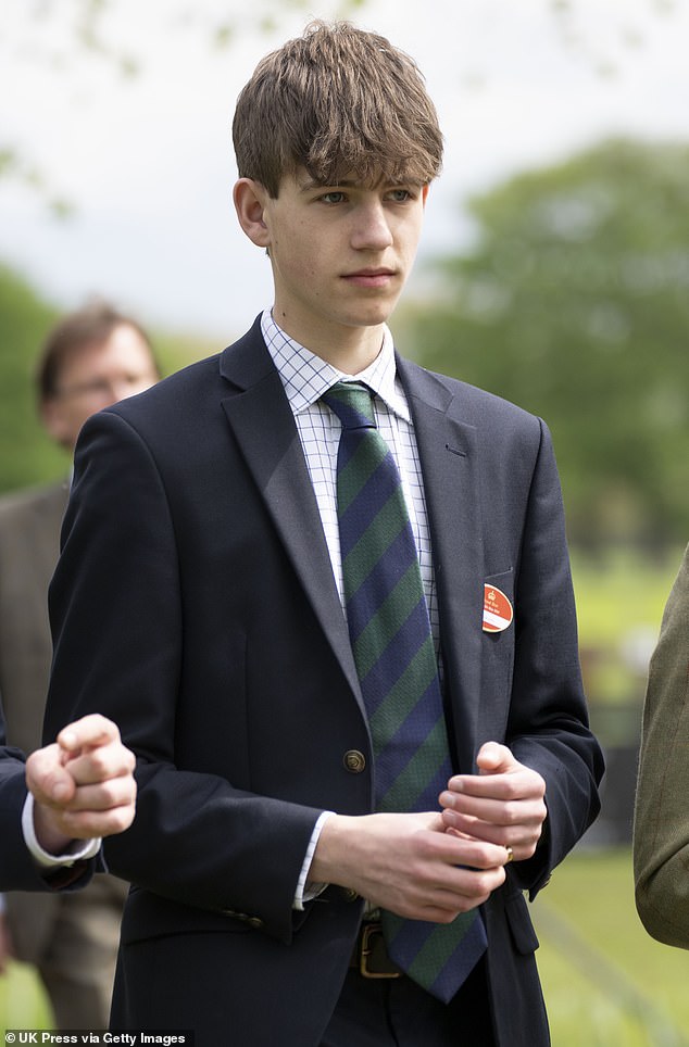 James, Earl of Wessex, looked dapper in a navy suit and striped tie as he joined his parents as a spectator at the Royal Windsor Horse Show.