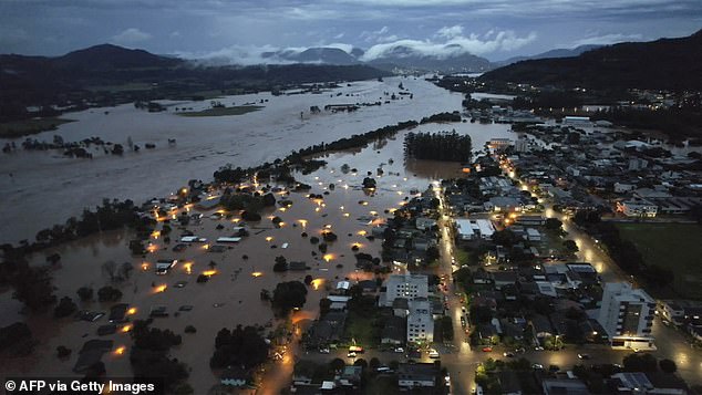 An aerial view shows flooded areas in Encantado city, Rio Grande do Sul on May 1
