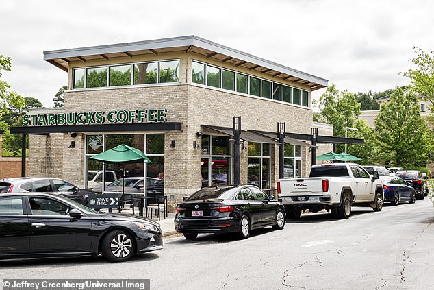 Starbucks in Atlanta, Georgia, with a long line of cars at the drive thru