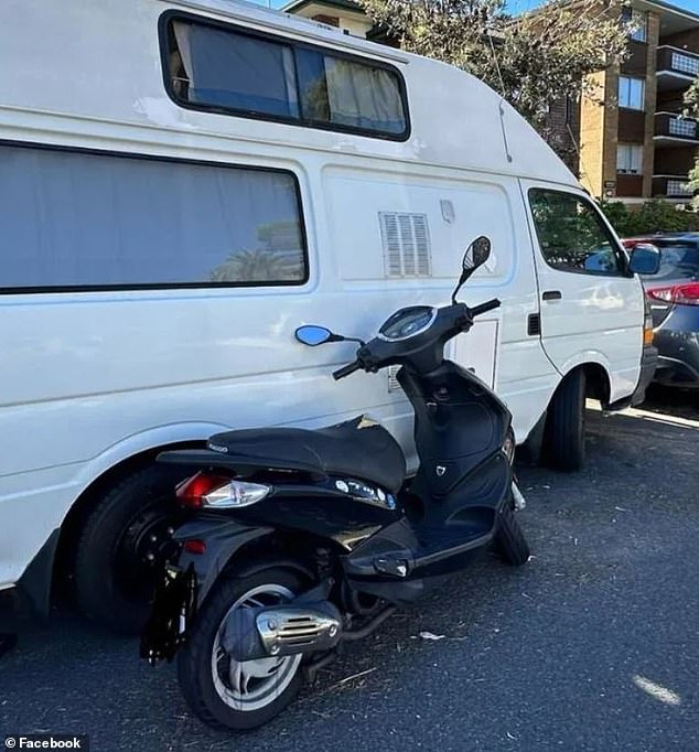 Ms Brown could have risked a fine because the scooter was left double parked next to a white caravan (pictured).