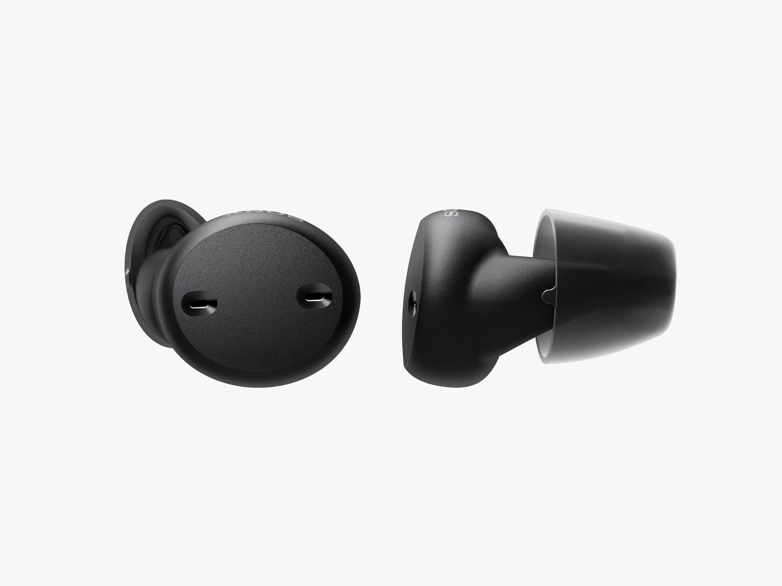 Side view of two black in-ear headphones
