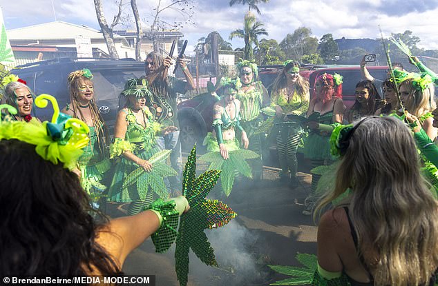 The 'ganja fairy' dancers with their marijuana leaf fans are the highlight of the parade