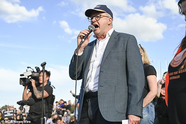 The women urged the Prime Minister to do more to tackle gender-based violence and increase payments to job seekers. She is pictured speaking at No More! National Anti-Violence Rally March at Parliament House in Canberra last Sunday