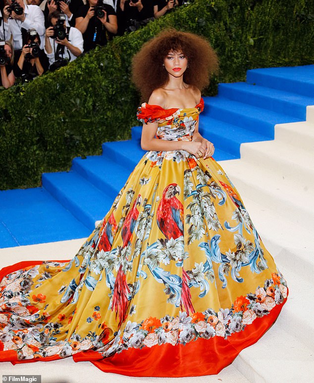 Zendaya wore a stunning floral print off-the-shoulder ballgown by Dolce & Gabbana in Rei Kawakubo/Comme des Garcons: Art of the In-Between