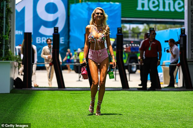 Slovakian model Veronika Rajek walks through the paddock of the Miami International Speedway