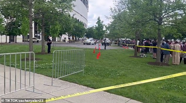 A field outside the stadium is cordoned off after a person dies after falling from the stands