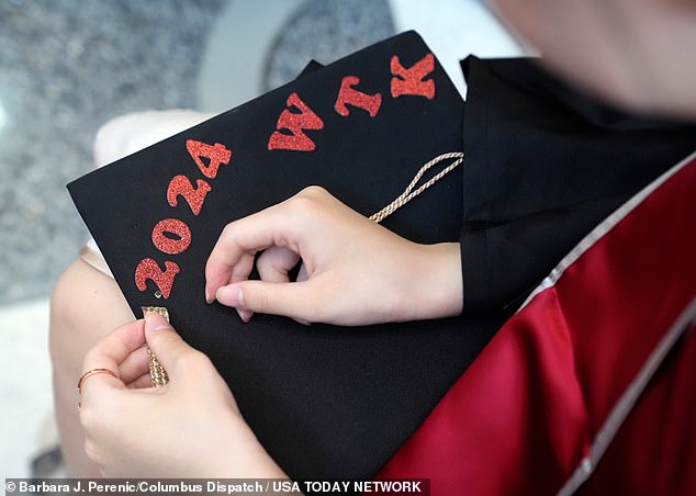 Tongke Wang, a student from China, decorated her cap for Ohio State University's graduation ceremony.