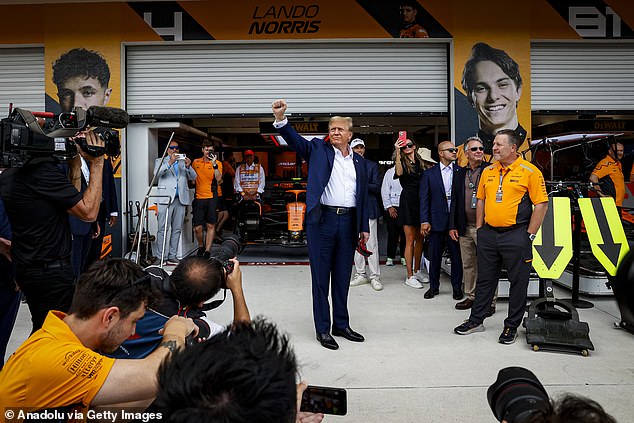 The politician, flanked by secret service agents, also met with the heads of F1 and the FIA.