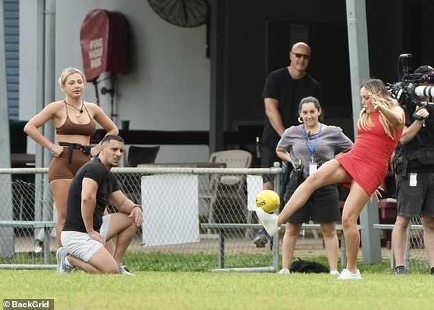 Charlotte, who joined the Australian series after leaving Geordie Shore, took to the field in a skimpy red dress.