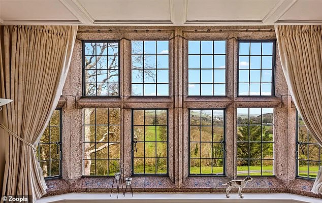 The property has many original features including very decorative windows.