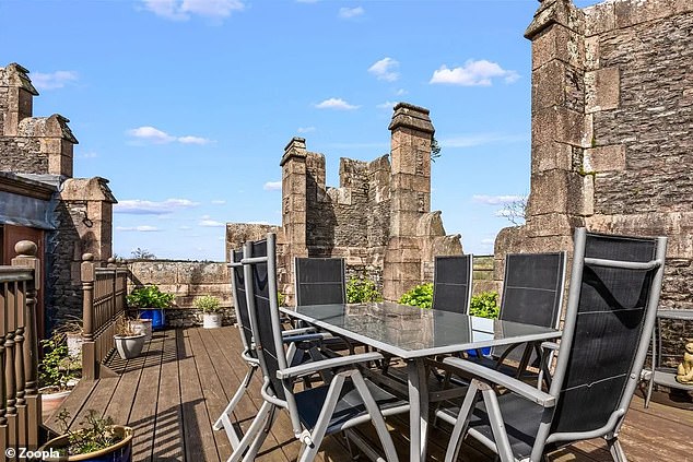 The roof terrace has space for dining, with a table that seats half a dozen guests.