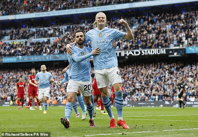 Man City kept the pressure on Arsenal at the top of the table by thrashing Wolves 5-1 on Saturday.