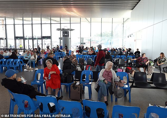 Inside the White Bay terminal, expectant travelers and families picking up loved ones say the terminal ran out of food all day.